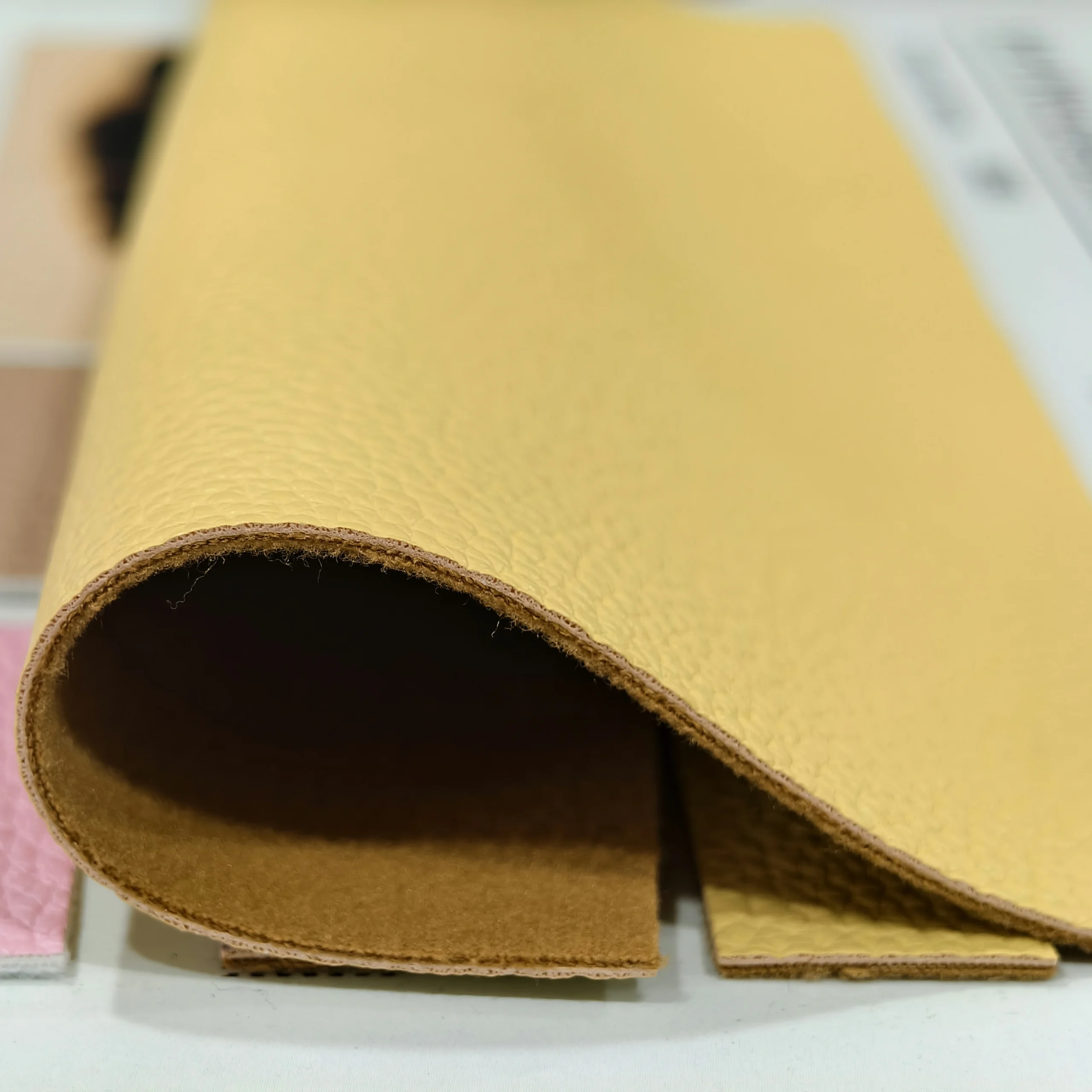 Danhon 1.3mm yellow pebble grain PU leather thickness detail image showing material profile