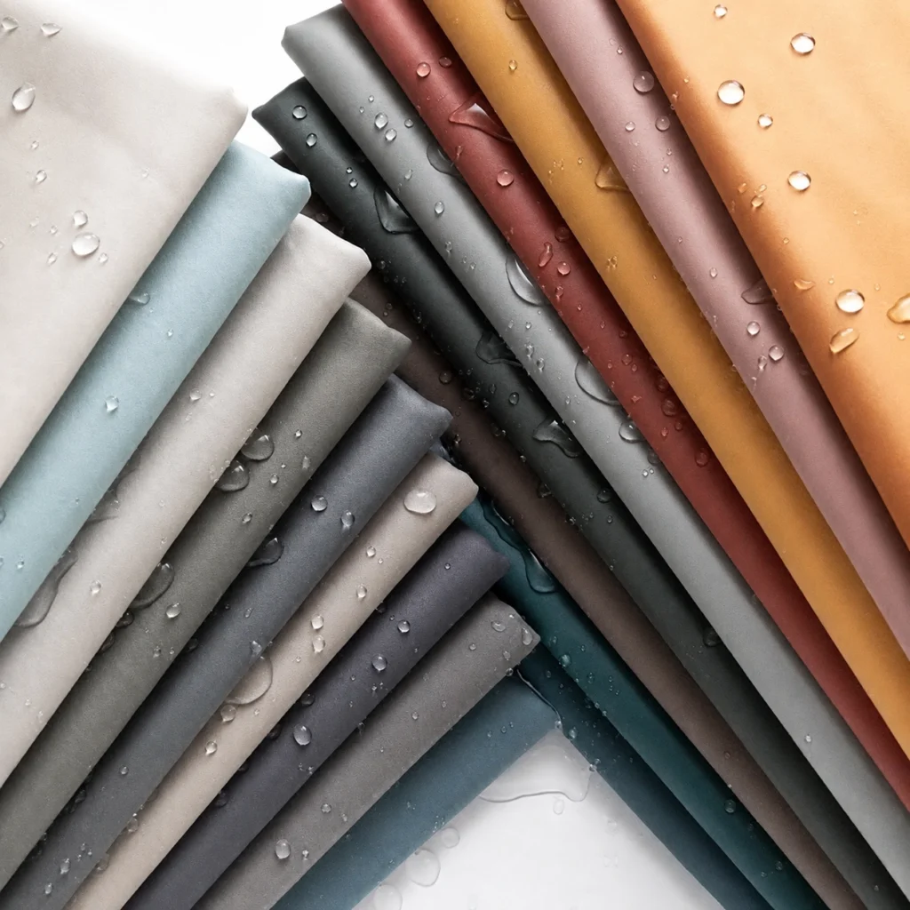 Waterborne PU leather and solvent-free PU leather swatches compared on a material review table