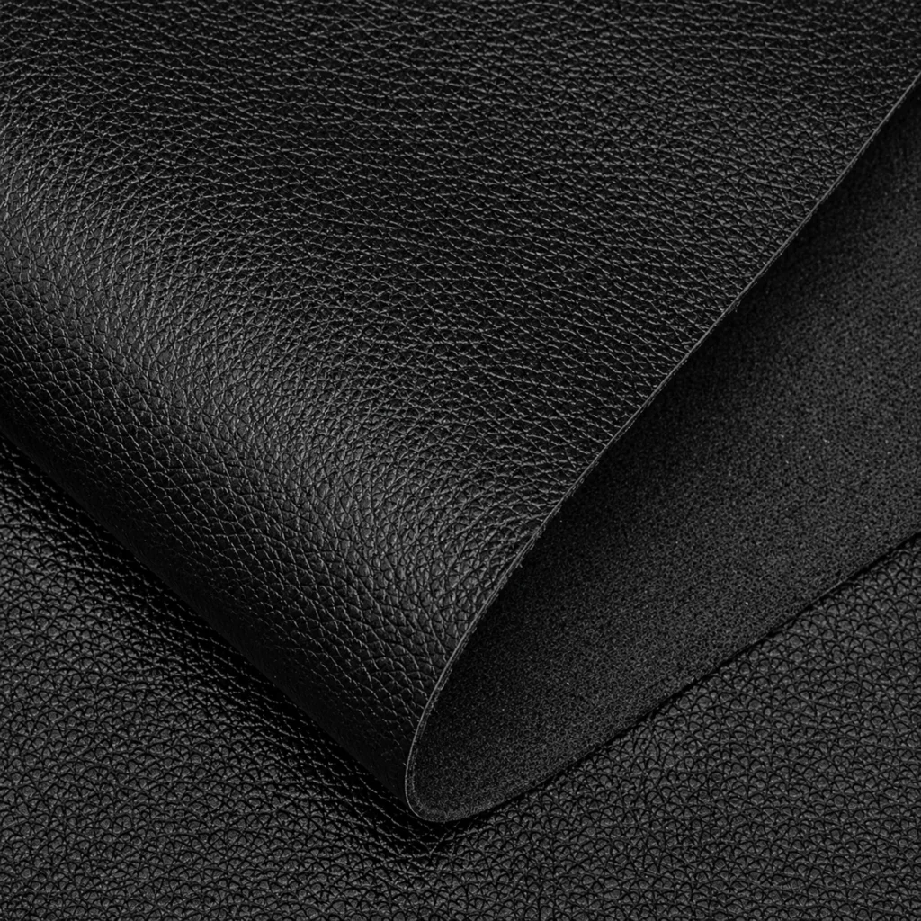 Close-up of PU artificial leather samples turned over to compare textile backing construction for backpacks