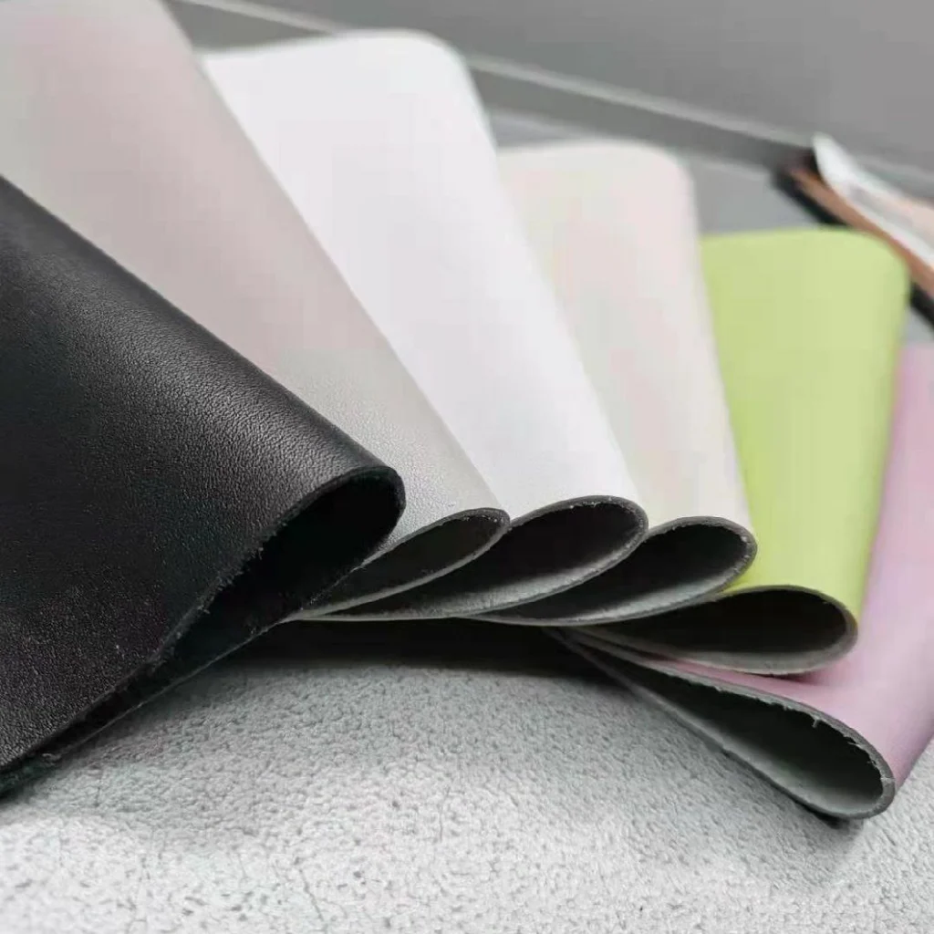 PU leather samples being compared for thickness, backing, flexibility and surface finish
