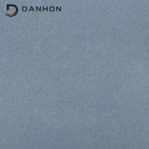 Close-up of blue-grey TPU leather material with a fine textured matte-looking surface