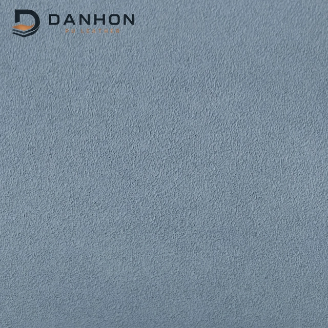 Close-up of blue-grey TPU leather material with a fine textured matte-looking surface