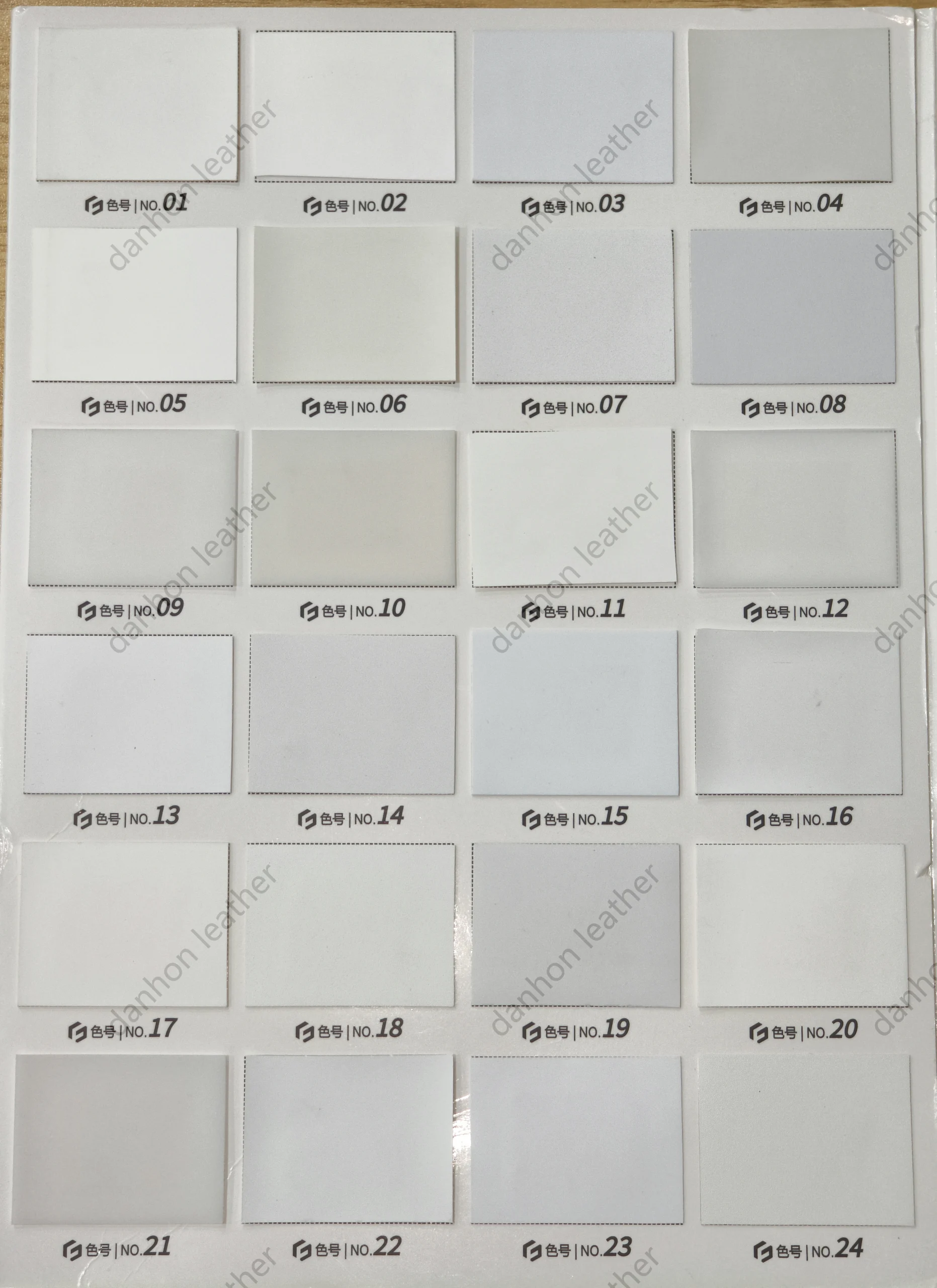 TPU leather color card showing numbered swatches No.01 to No.24 in white, off-white and light neutral tones